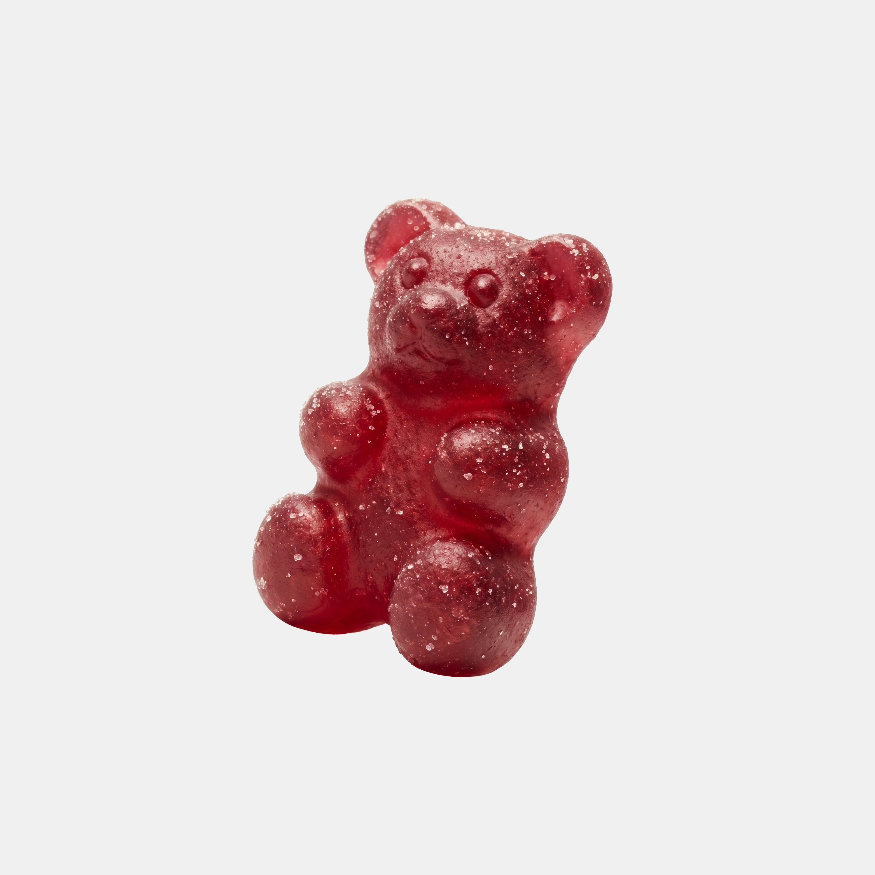 GreenPeople Cortisol Balance Gummies shown in a clear container with colorful gummies on a white background.